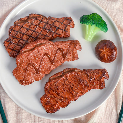 Simulation Food Model Photo Photography Props, 1 PC Brushed Steak, 1 PC Fragrant Steak, 1 PC Linger Steak, 2 PCS Chicken Wings, 3 PCS Poached Egg, 3 PCS Hot Dog, 3 PCS Squid, 3 PCS Pork Mouth, 4 PCS Broccoli, 4 PCS Mushroom, 4 PCS Corn, 10 PCS Kelp    ...